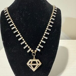 Elegant Gold and Silver Necklace